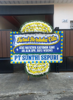 Papan Bunga Duka di Assue