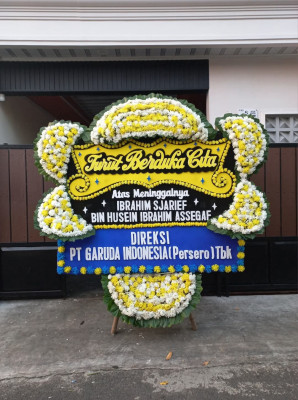 Papan Bunga Duka di Assue